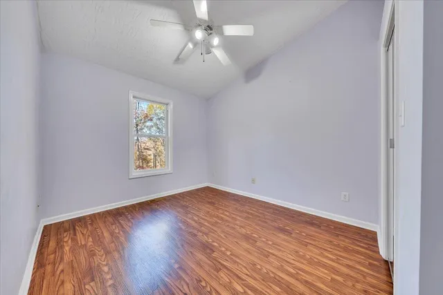a view of wooden balcony with wooden floor