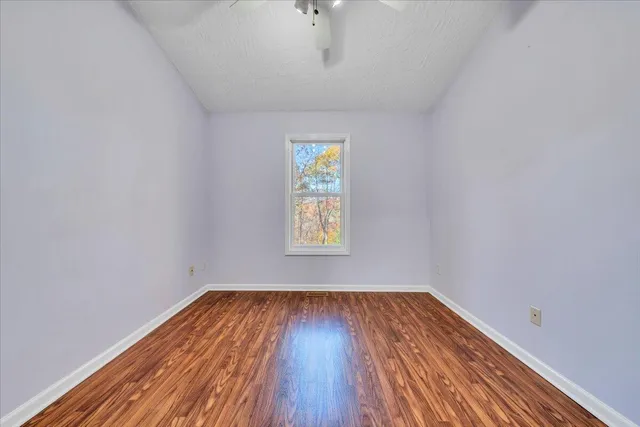 a view of wooden balcony with wooden floor