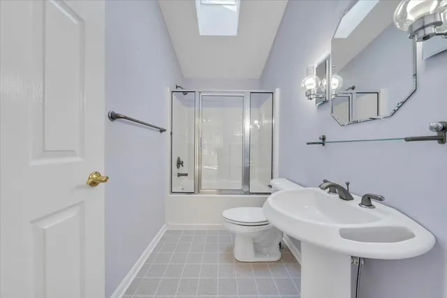 a view of a yard with large trees