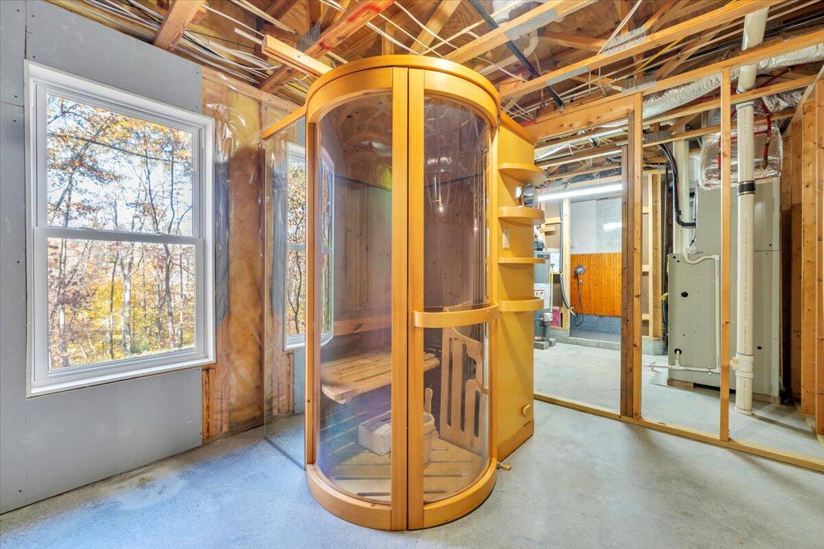6548 Goodview Road Goodview, VA 24095 - Photo 29 of 113 a view of a room with wooden floor and windows