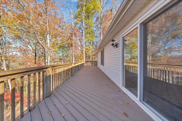 a view of a house with a snow in the yard