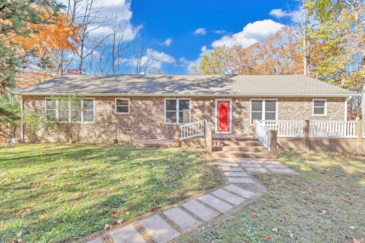 6548 Goodview Road Goodview, VA 24095 - Photo 38 of 113 a view of a house with backyard porch and patio