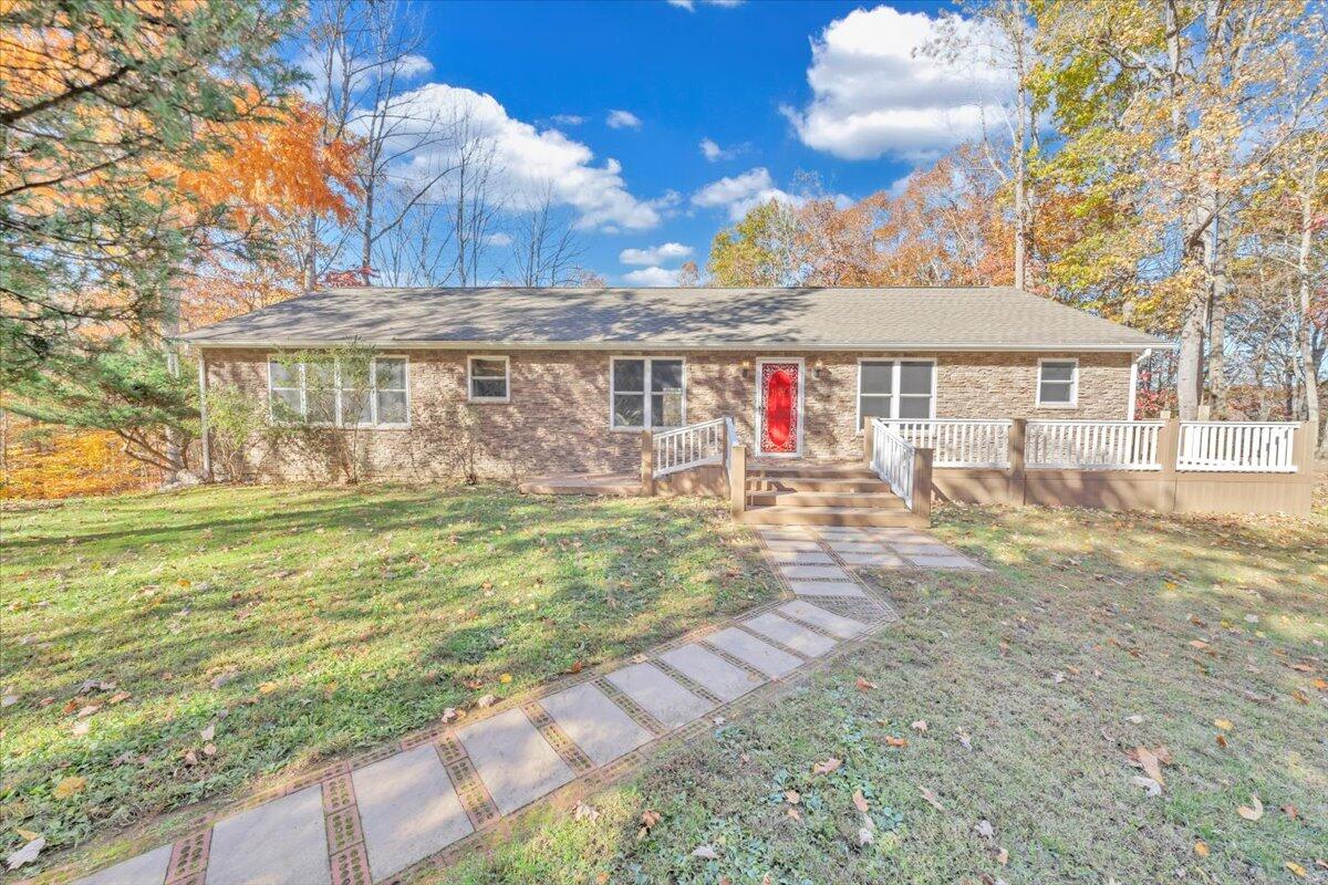 6548 Goodview Road Goodview, VA 24095 - Photo 39 of 113 a view of a house with backyard and sitting area