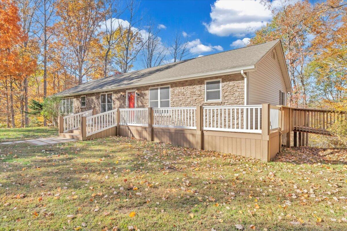 6548 Goodview Road Goodview, VA 24095 - Photo 40 of 113 a front view of a house with a garden