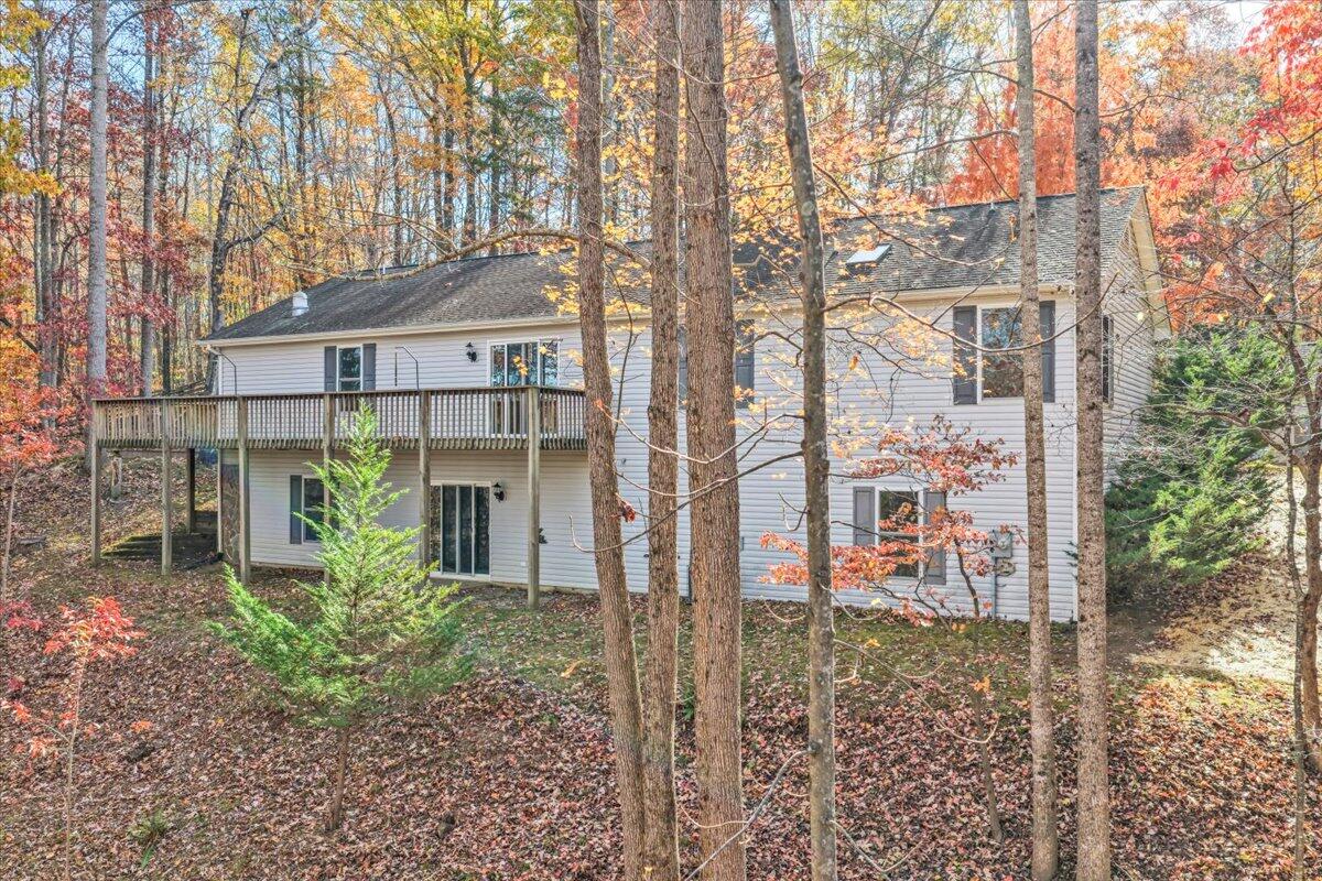 6548 Goodview Road Goodview, VA 24095 - Photo 46 of 113 a backyard of a house with lots of green space
