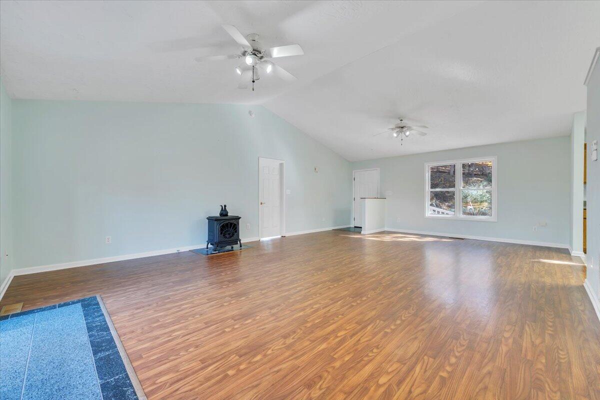 6548 Goodview Road Goodview, VA 24095 - Photo 5 of 113 a view of empty room with wooden floor
