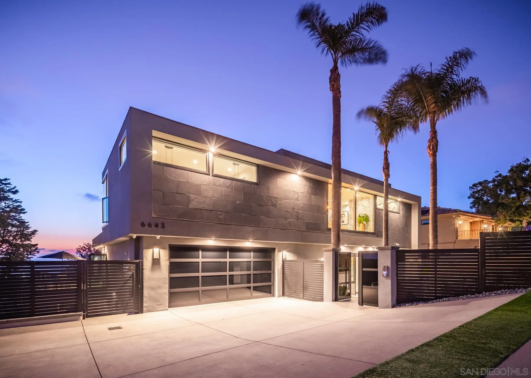 6643 Muirlands Drive La Jolla, CA 92037 - Photo 15 of 16 a view of backyard with a large tree