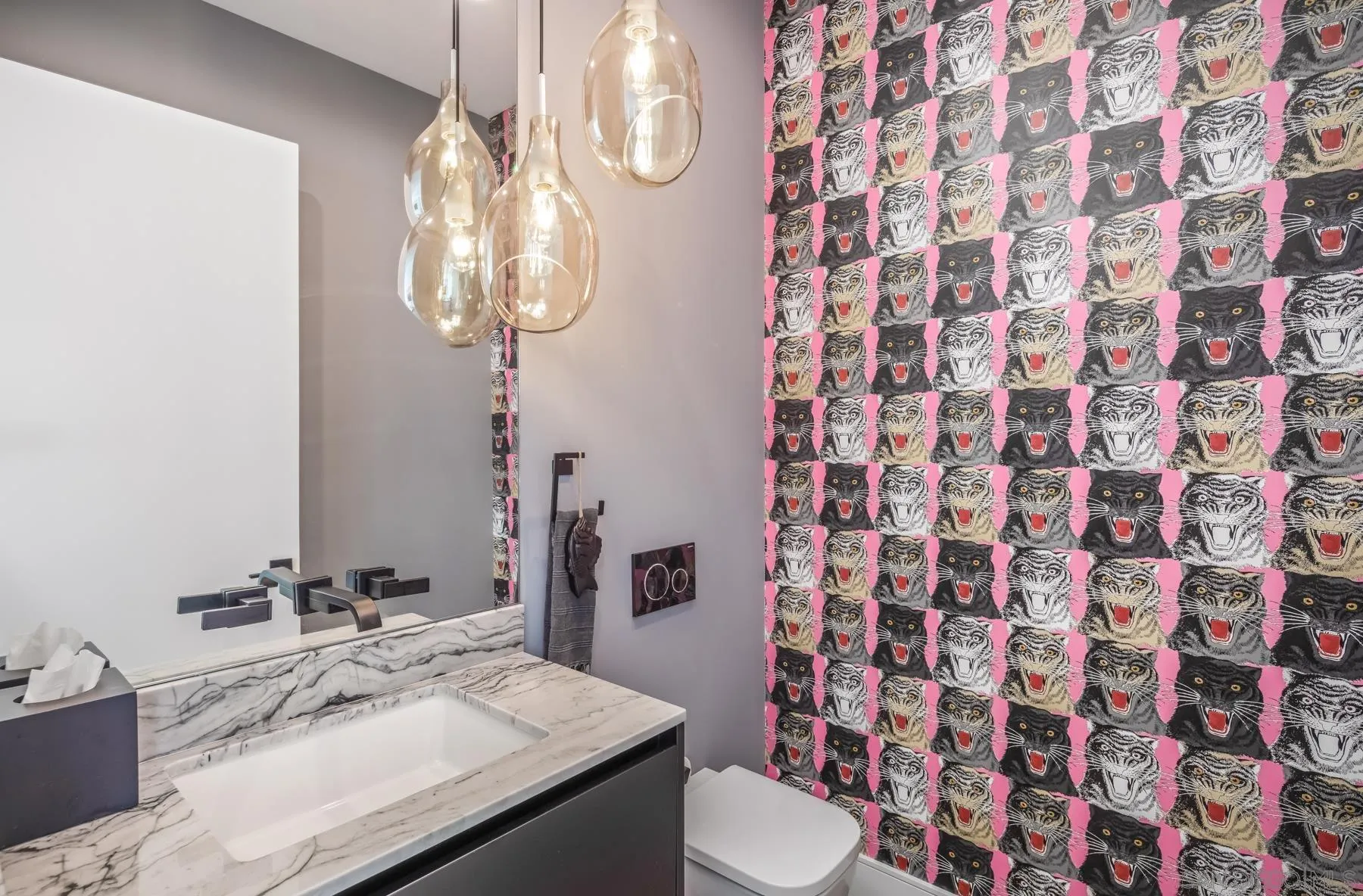 6643 Muirlands Drive La Jolla, CA 92037 - Photo 6 of 16 a bathroom with a sink toilet and shower