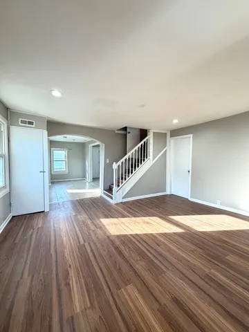 a view of a livingroom with a staircase