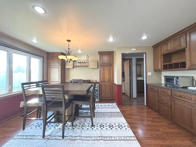 a view of a dining room with furniture