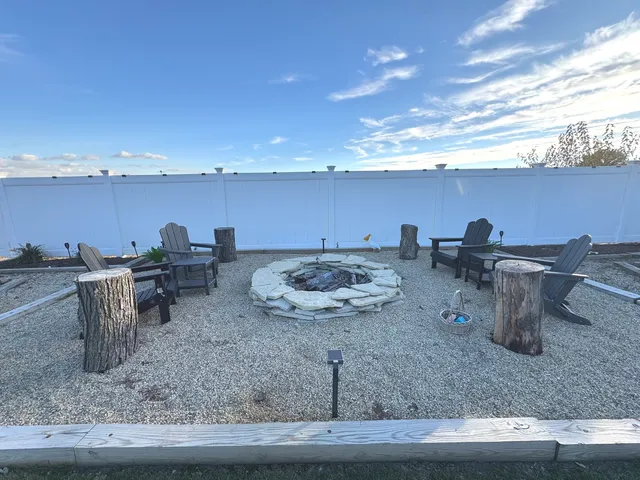 a kitchen with a stove and a white refrigerator