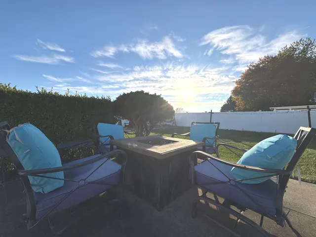 a view of a terrace with furniture