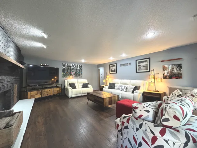 a living room with furniture and a couch