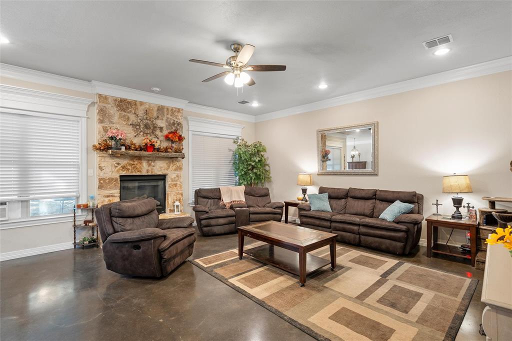 2370 Garrett Lane China Spring, TX 76633 - Photo 11 of 36 a living room with furniture and a fireplace