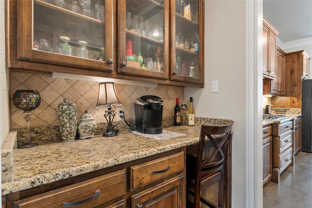 2370 Garrett Lane China Spring, TX 76633 - Photo 18 of 36 a kitchen with a sink and cabinets