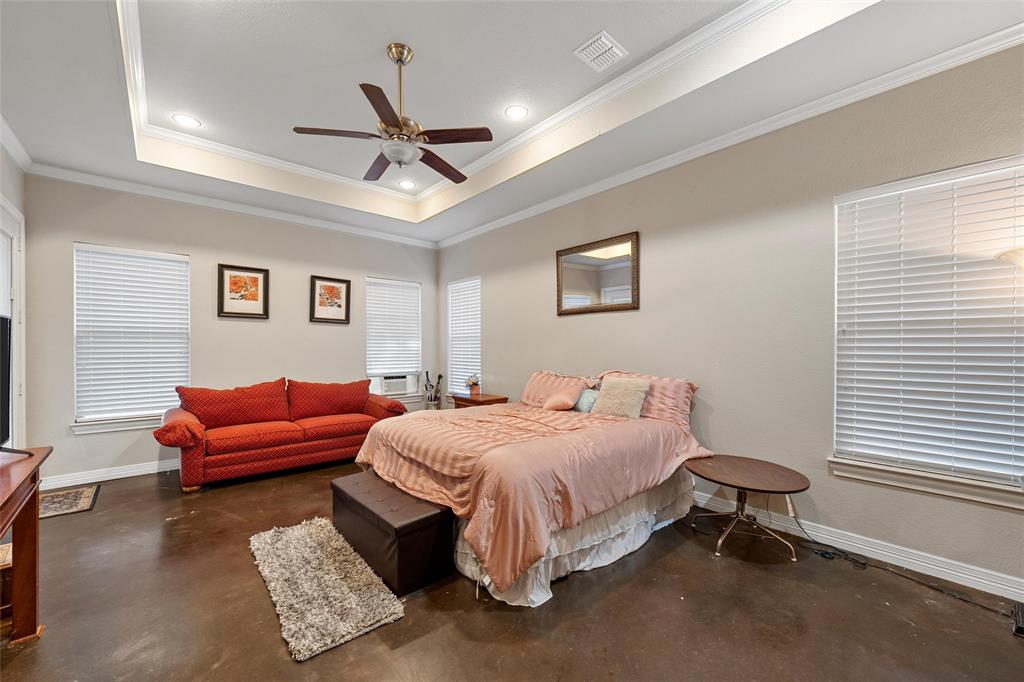 2370 Garrett Lane China Spring, TX 76633 - Photo 20 of 36 a bedroom with a bed and a couch