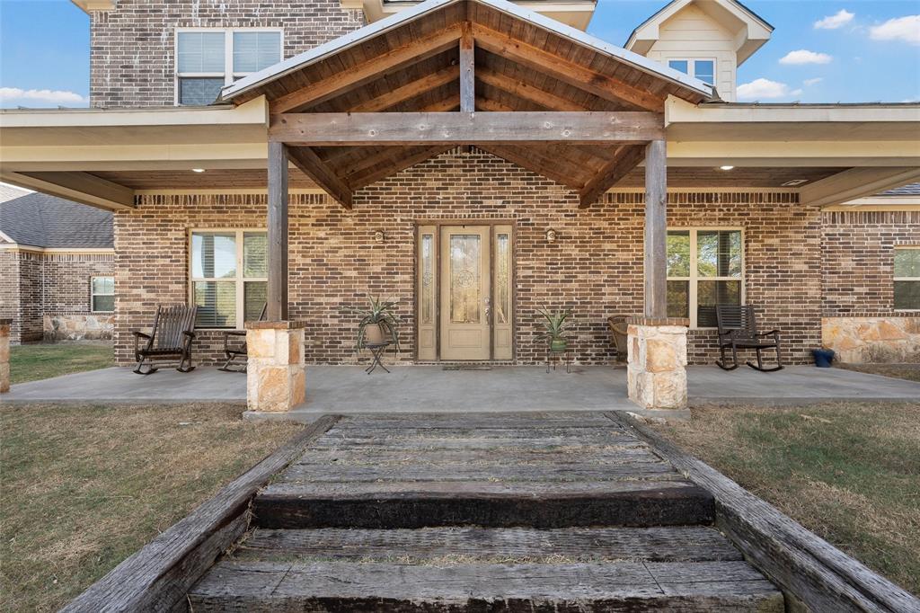 2370 Garrett Lane China Spring, TX 76633 - Photo 2 of 36 a front view of a house with garden