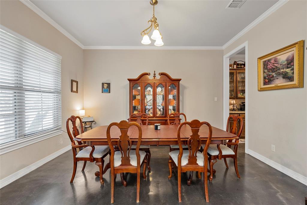 2370 Garrett Lane China Spring, TX 76633 - Photo 8 of 36 a view of a dining room with furniture window and wooden floor