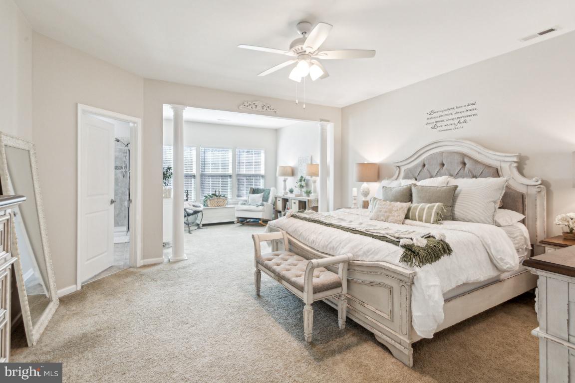 16 Grace Drive Marlton, NJ 08053 - Photo 11 of 24 a bedroom with bed and a chandelier