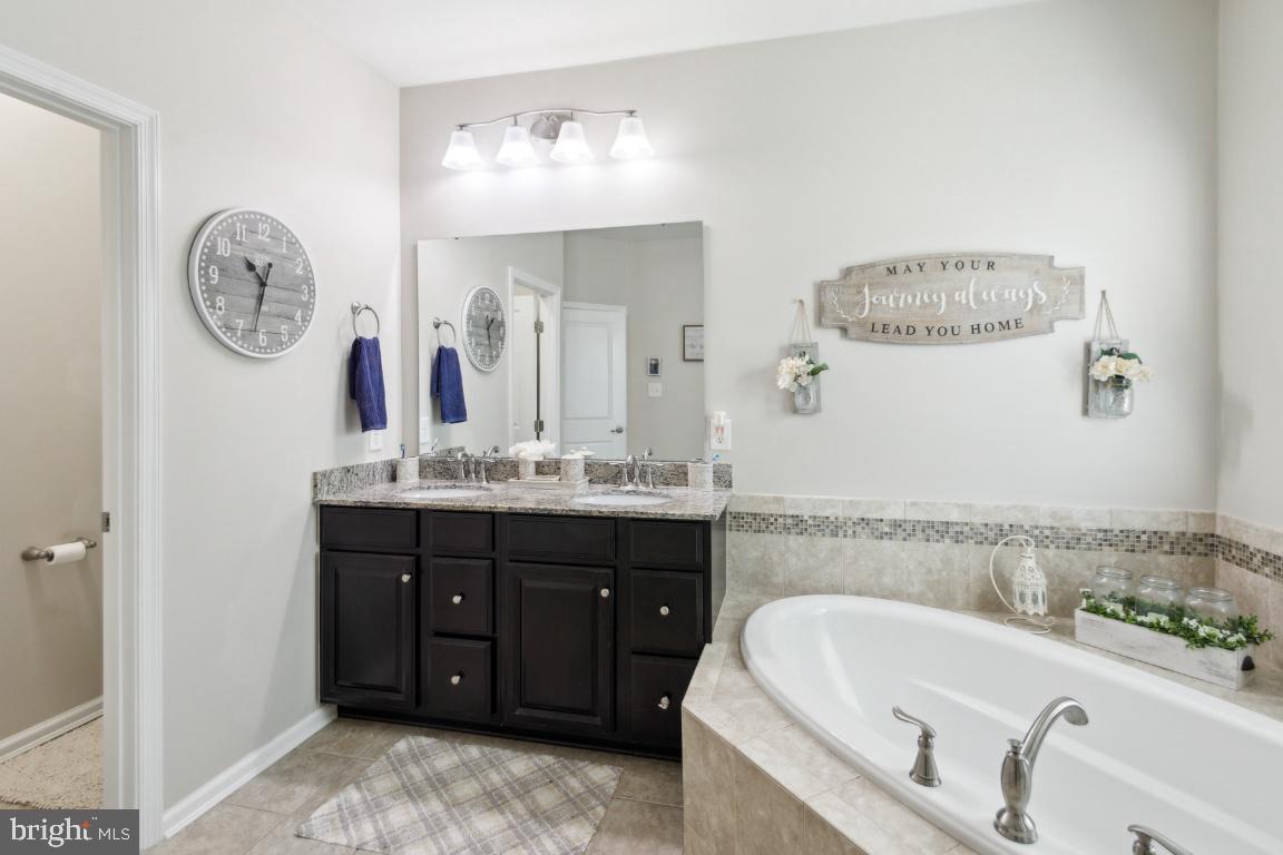 16 Grace Drive Marlton, NJ 08053 - Photo 15 of 24 a bathroom with a tub sink and mirror