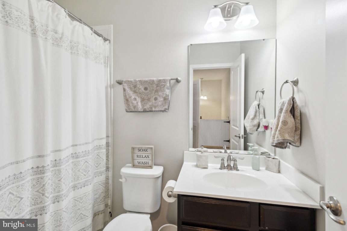 16 Grace Drive Marlton, NJ 08053 - Photo 18 of 24 a bathroom with a sink vanity mirror and toilet