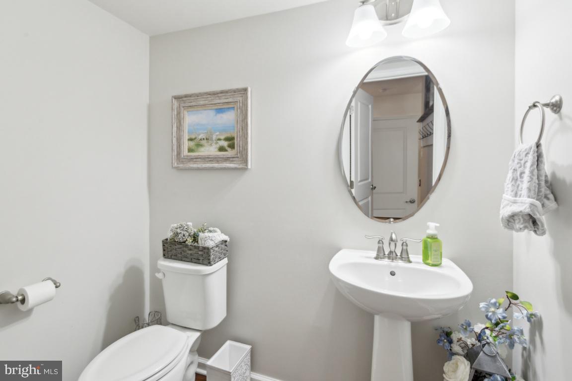 16 Grace Drive Marlton, NJ 08053 - Photo 22 of 24 a bathroom with a toilet sink and mirror