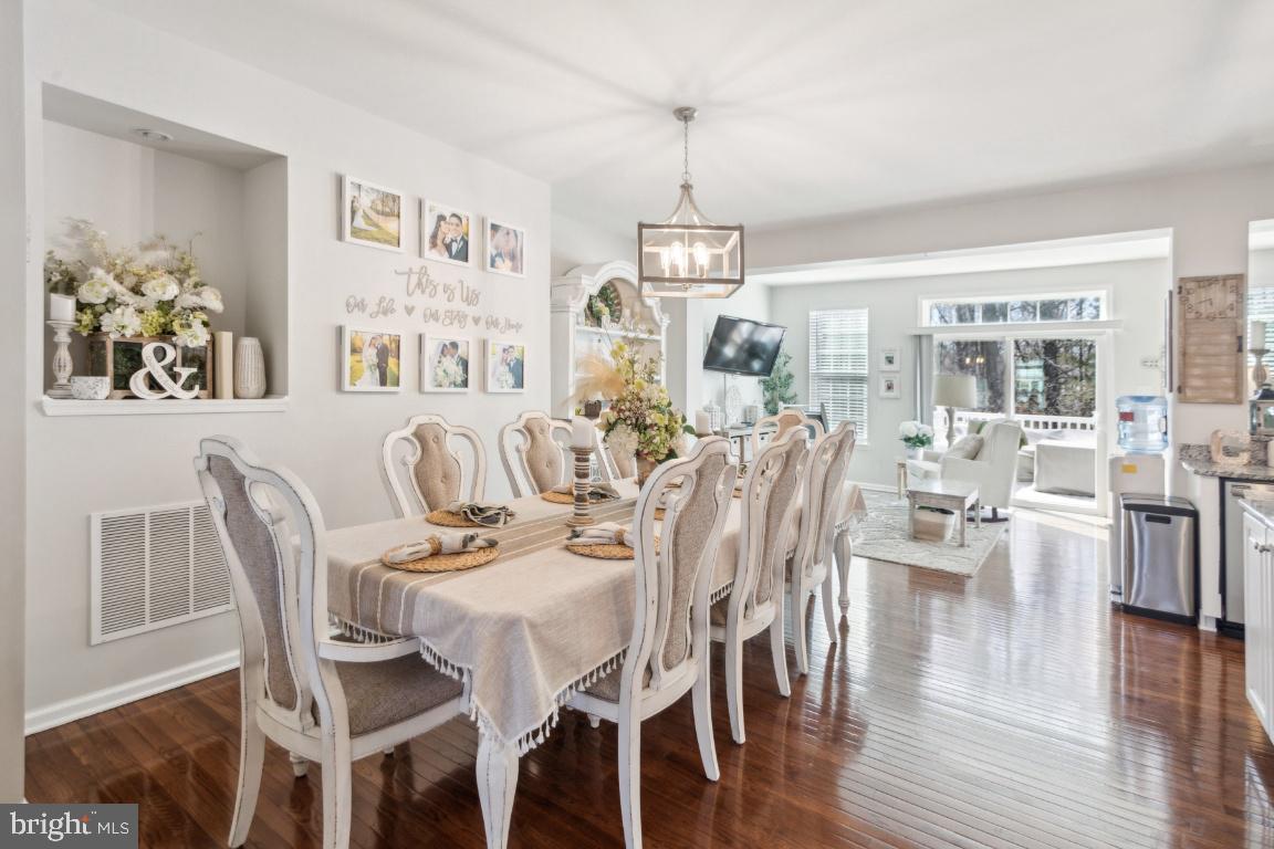 16 Grace Drive Marlton, NJ 08053 - Photo 6 of 24 a view of a dining room with furniture wooden floor and chandelier