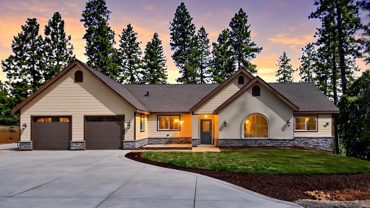 10279 Evergreen Ranch Court Grass Valley, CA 95949 - Photo 1 of 79 a front view of a house with garden
