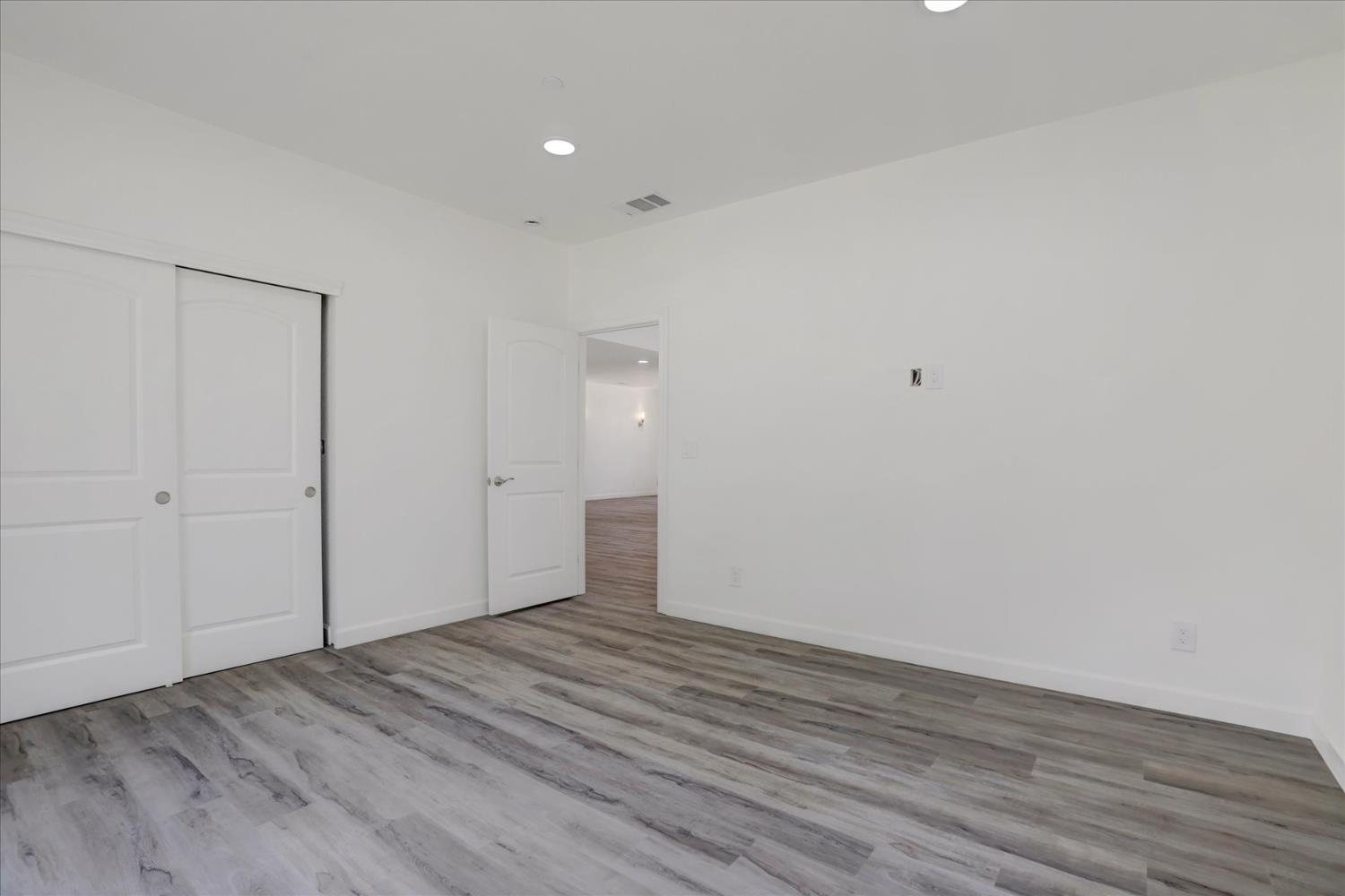 10279 Evergreen Ranch Court Grass Valley, CA 95949 - Photo 51 of 79 a view of an empty room with wooden floor