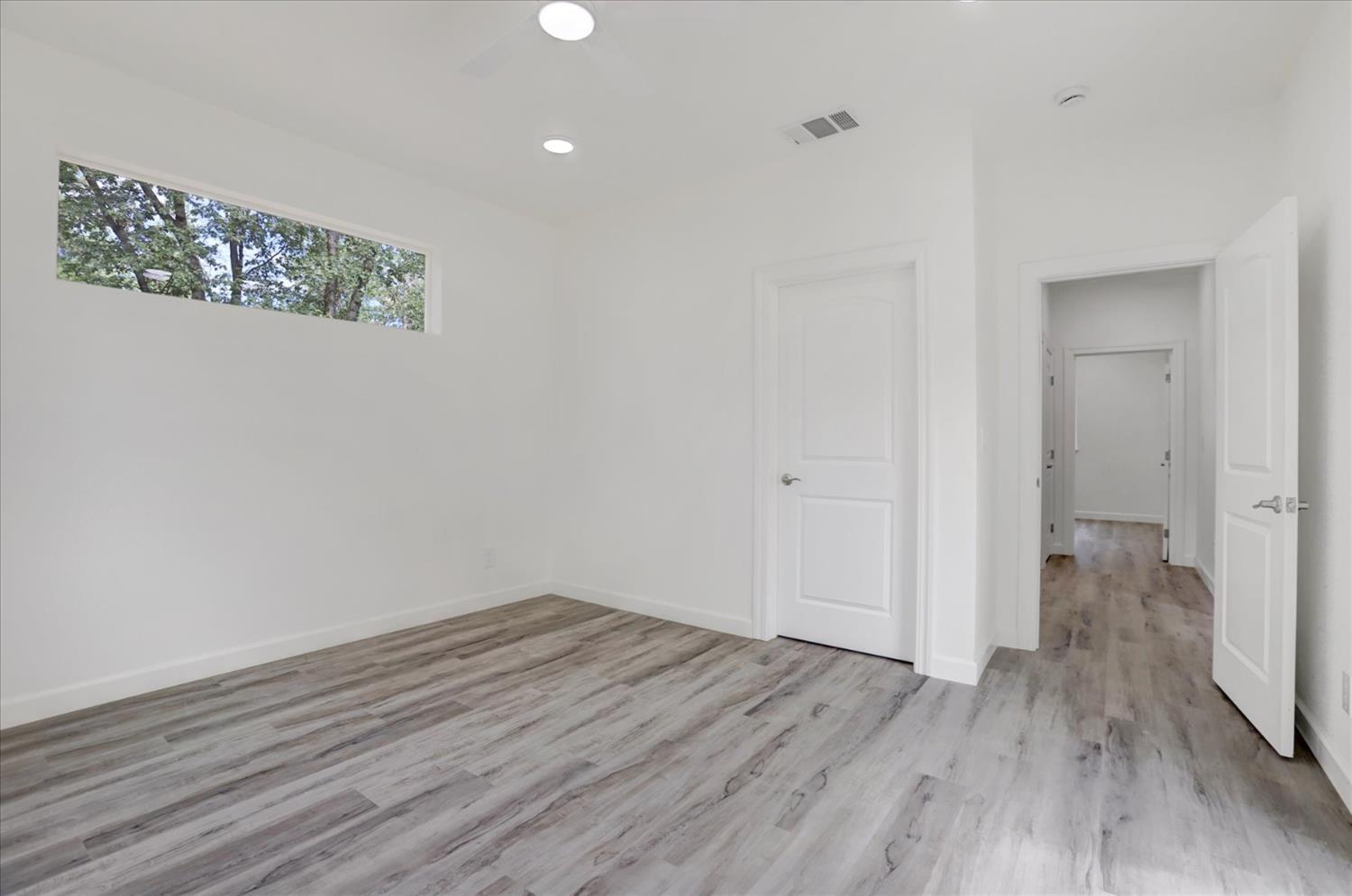 10279 Evergreen Ranch Court Grass Valley, CA 95949 - Photo 60 of 79 a view of a room with wooden floor and a hallway