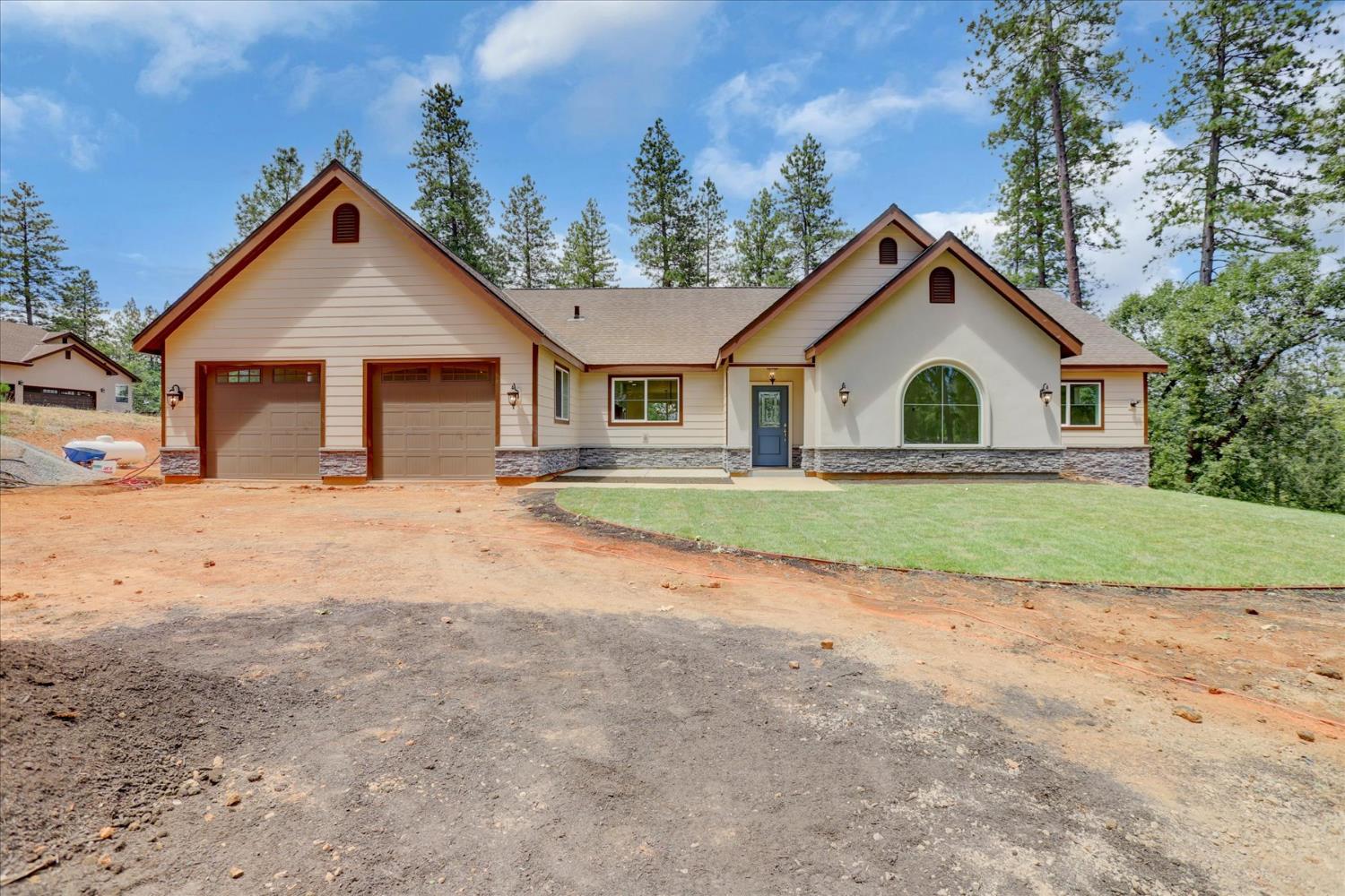 10279 Evergreen Ranch Court Grass Valley, CA 95949 - Photo 73 of 79 a view of a house with a yard