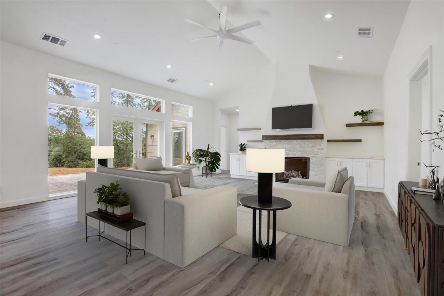 10279 Evergreen Ranch Court Grass Valley, CA 95949 - Photo 9 of 79 a living room with furniture a fireplace and a flat screen tv