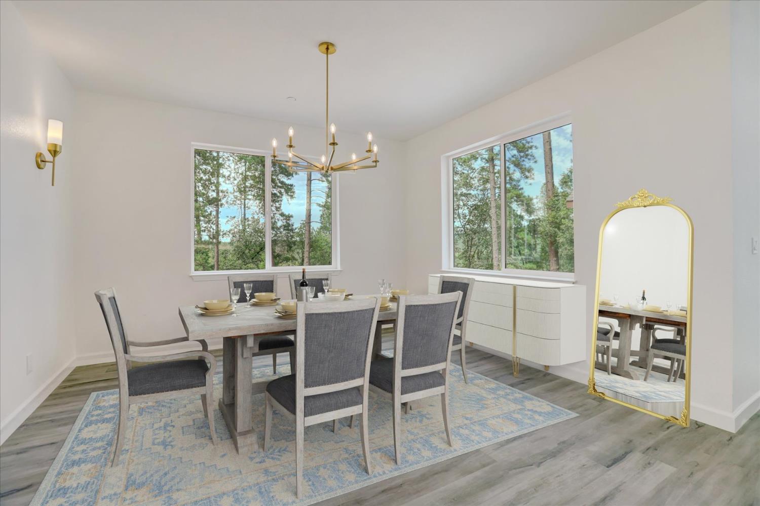 10279 Evergreen Ranch Court Grass Valley, CA 95949 - Photo 10 of 79 a view of a dining room with furniture window and wooden floor