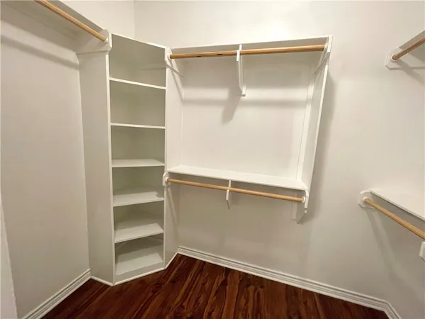 a view of an empty walk in closet