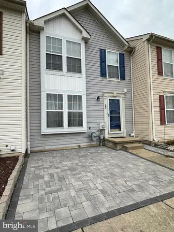 a view of a house with a door and a window