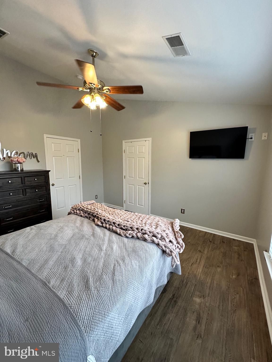 22 Carper Street Bear, DE 19701 - Photo 23 of 56 a bedroom with a bed and a chandelier