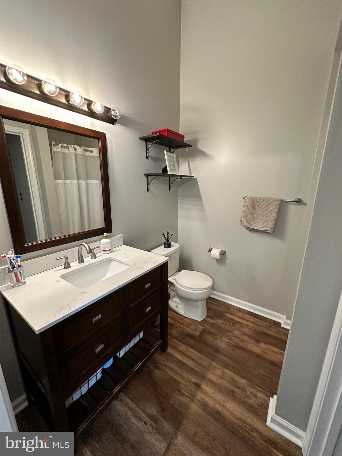 22 Carper Street Bear, DE 19701 - Photo 25 of 56 a bathroom with a sink and a mirror