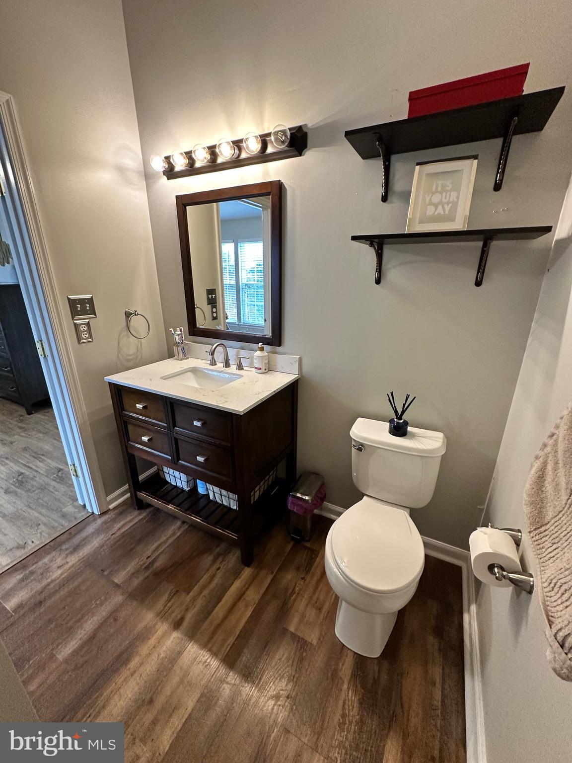 22 Carper Street Bear, DE 19701 - Photo 27 of 56 a bathroom with a toilet sink and mirror
