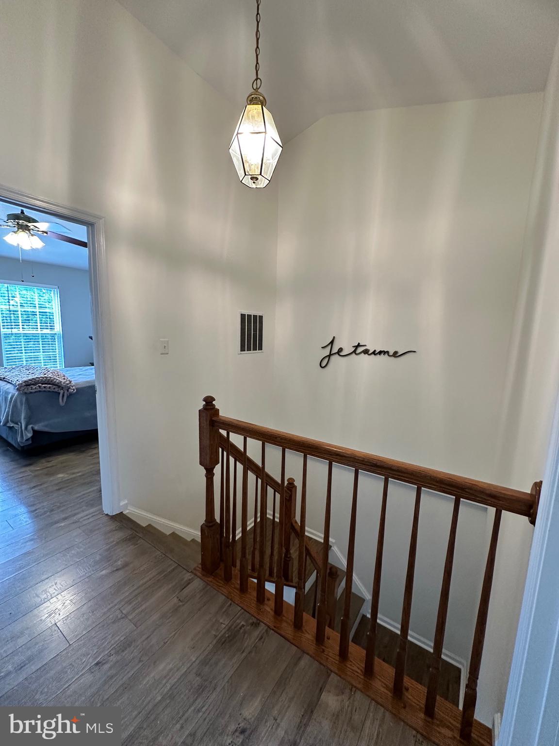 22 Carper Street Bear, DE 19701 - Photo 37 of 56 a view of a livingroom with wooden floor and staircase