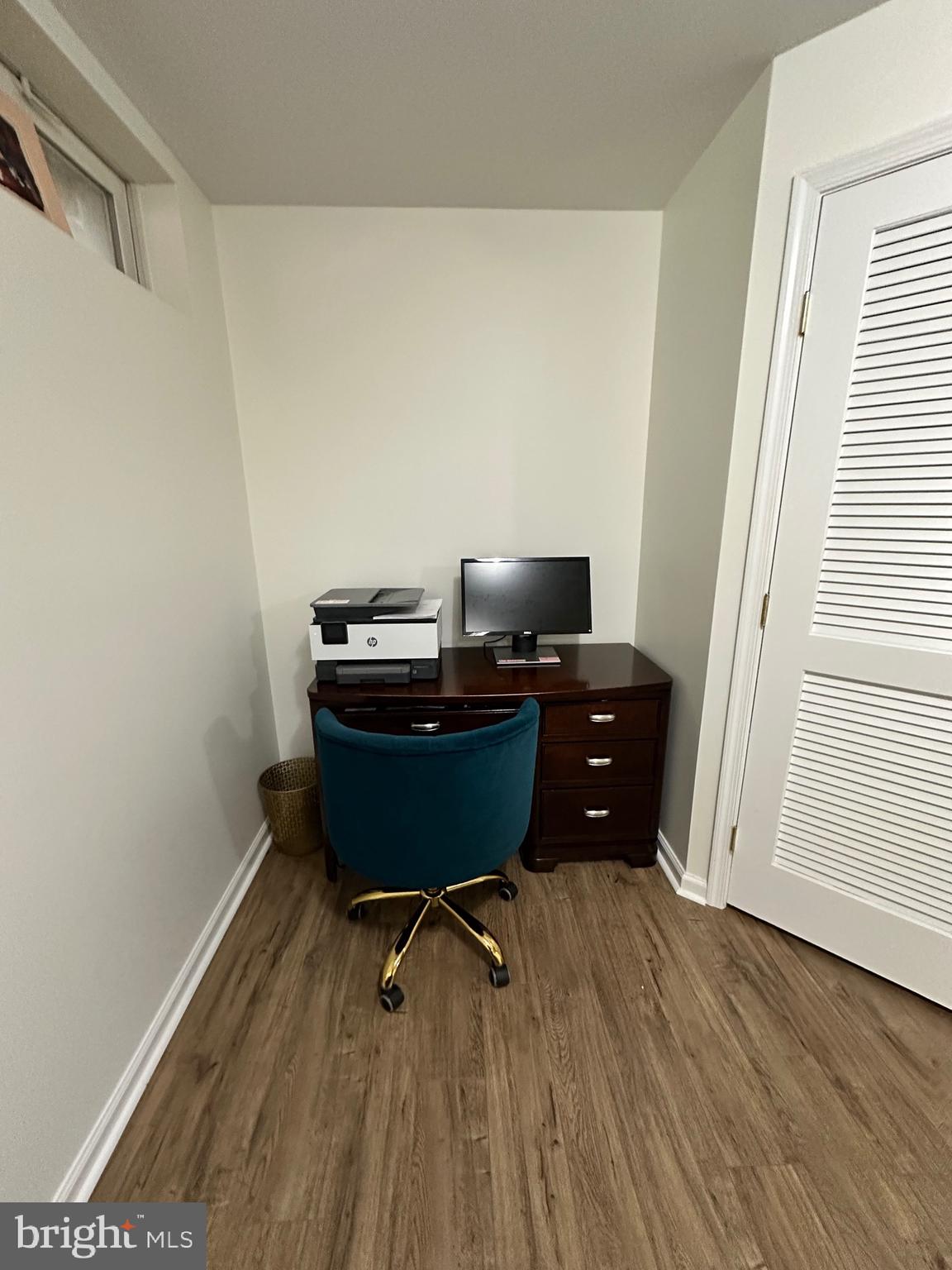 22 Carper Street Bear, DE 19701 - Photo 42 of 56 a room with wooden floor and a window