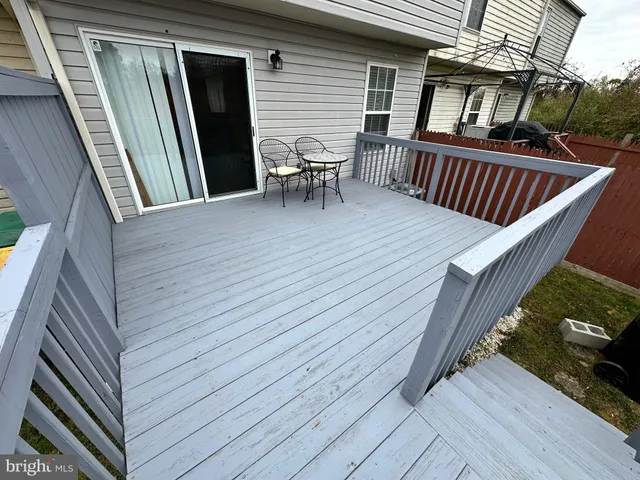 a view of a lake with houses in the back