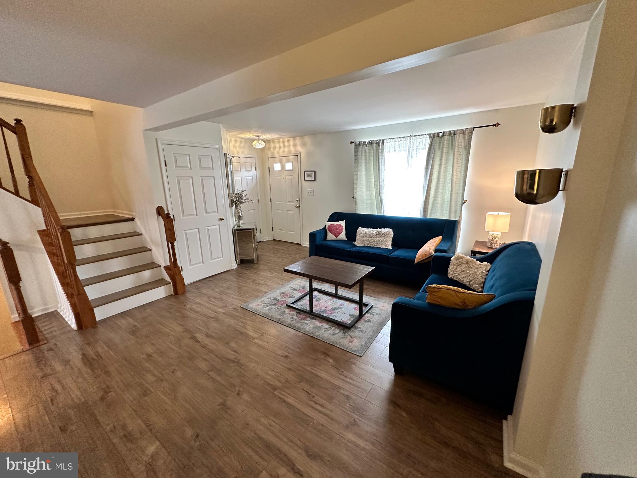 22 Carper Street Bear, DE 19701 - Photo 6 of 56 a living room with furniture and a wooden floor