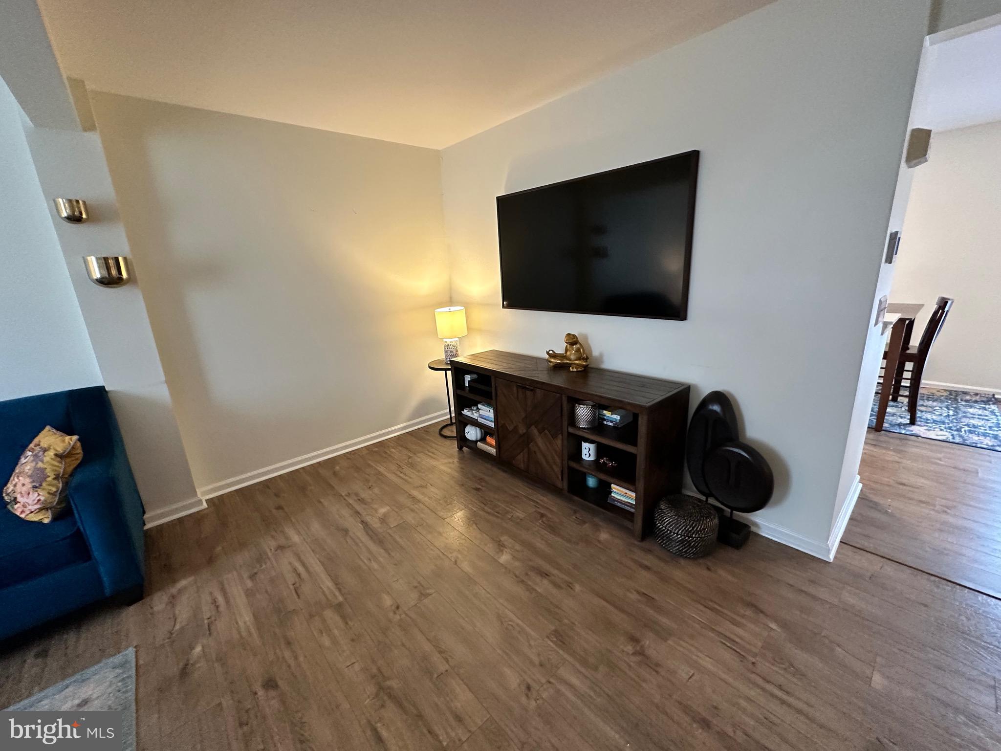 22 Carper Street Bear, DE 19701 - Photo 9 of 56 a living room with furniture and a flat screen tv