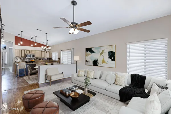 a living room with furniture or couch and a window