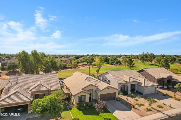 an aerial view of a house with a garden