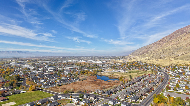 368 East 700 North Springville, UT 84663 - Photo 33 of 55 Aerial perspective of suburban area with a water and mountain view