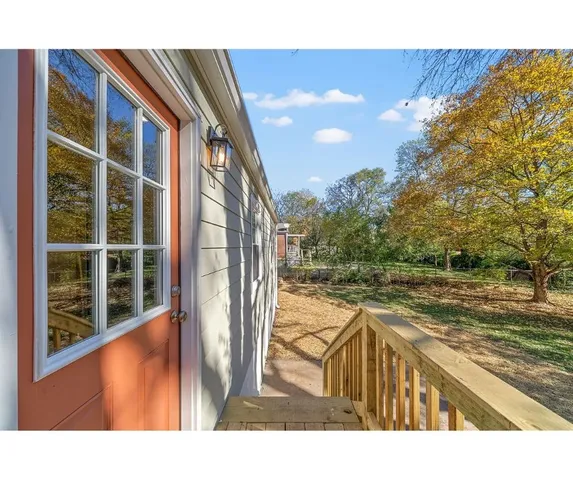 a view of swimming pool from a balcony