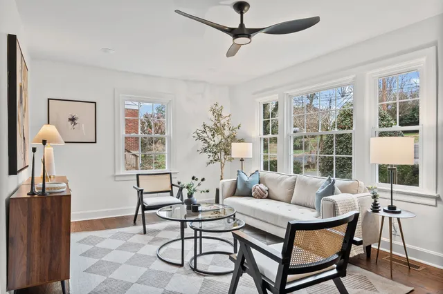 a living room with furniture and a window
