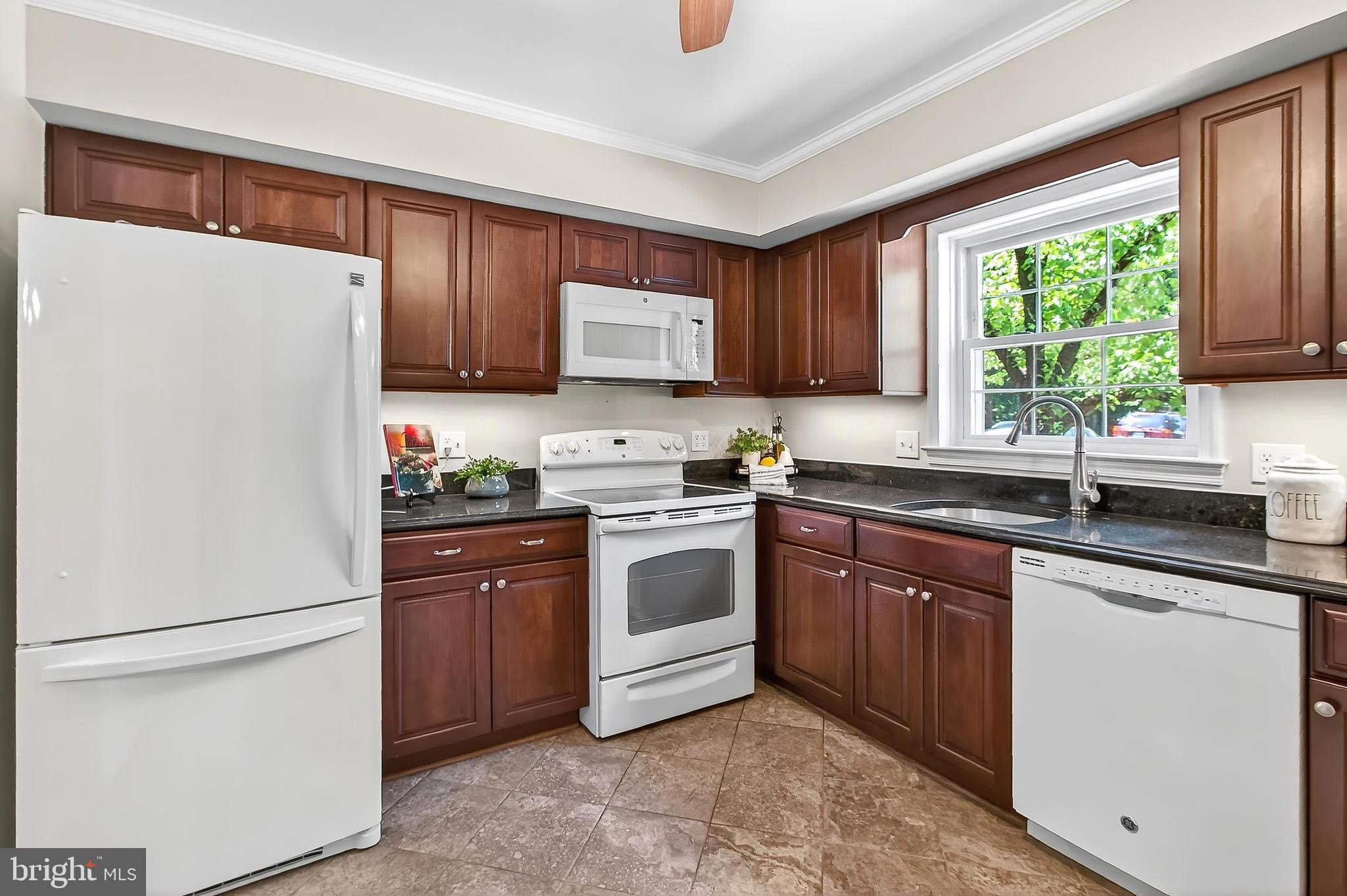 7781 Tiverton Drive Springfield, VA 22152 - Photo 13 of 53 Crown molding and a lighted ceiling fan