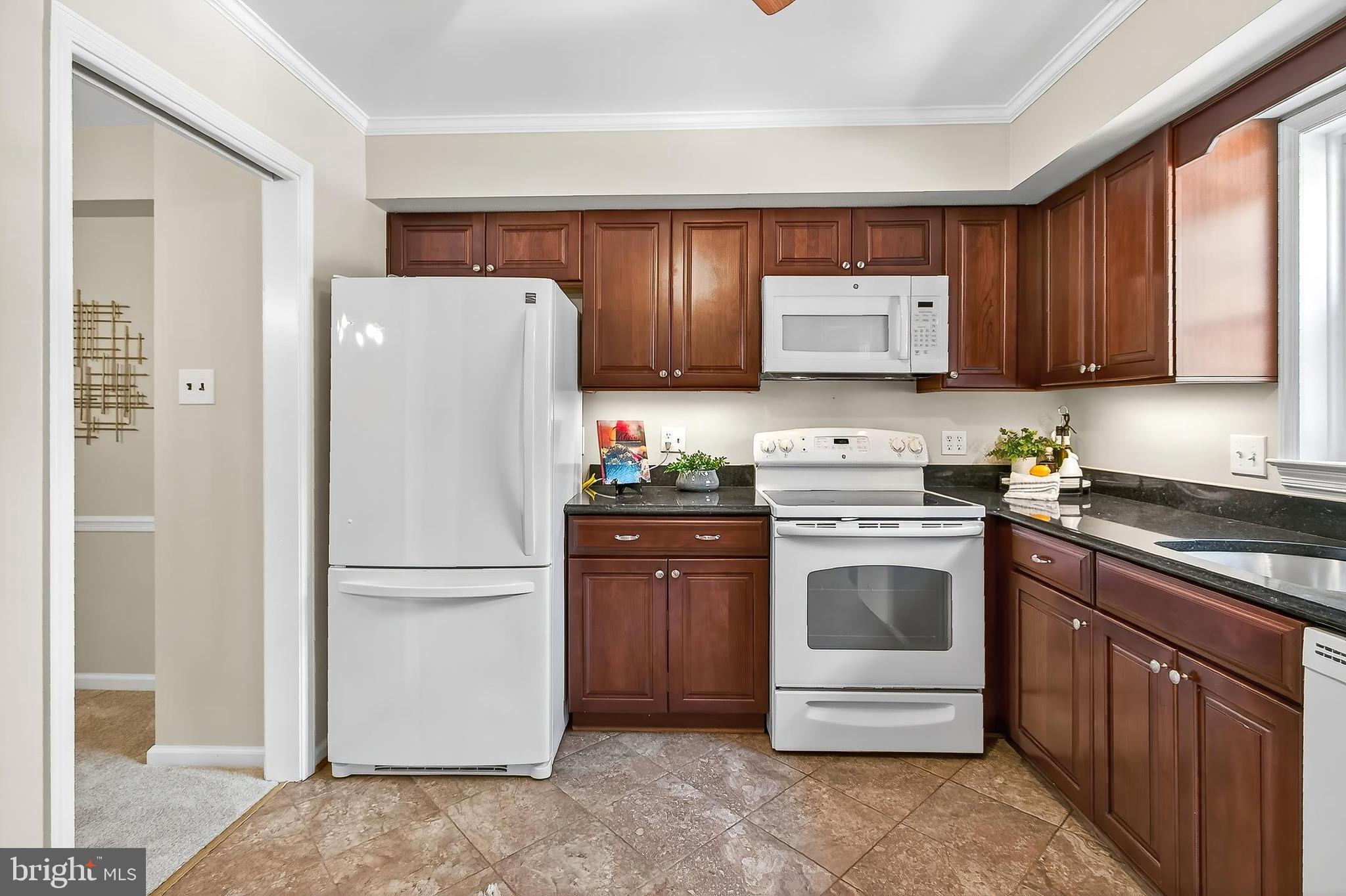 7781 Tiverton Drive Springfield, VA 22152 - Photo 14 of 53 Cherry cabinets and granite counters